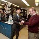 President Ronald J. Daniels (left) presents the President's Frontier Award to Scott Bailey.